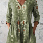 "Elise | Blusa Lunga con Decolleté a V". A minha loja