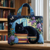 Borsa artigianale trapuntata con gatto nero sui libri A minha loja