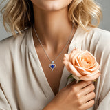 Collana a forma di cuore con zaffiro rosa