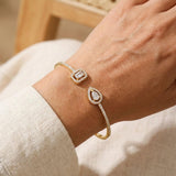 Bracciale Aperto in Oro con Doppia Gemma