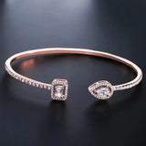 Bracciale Aperto in Oro con Doppia Gemma