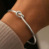 Bracciale Regolabile con Nodo Dorato