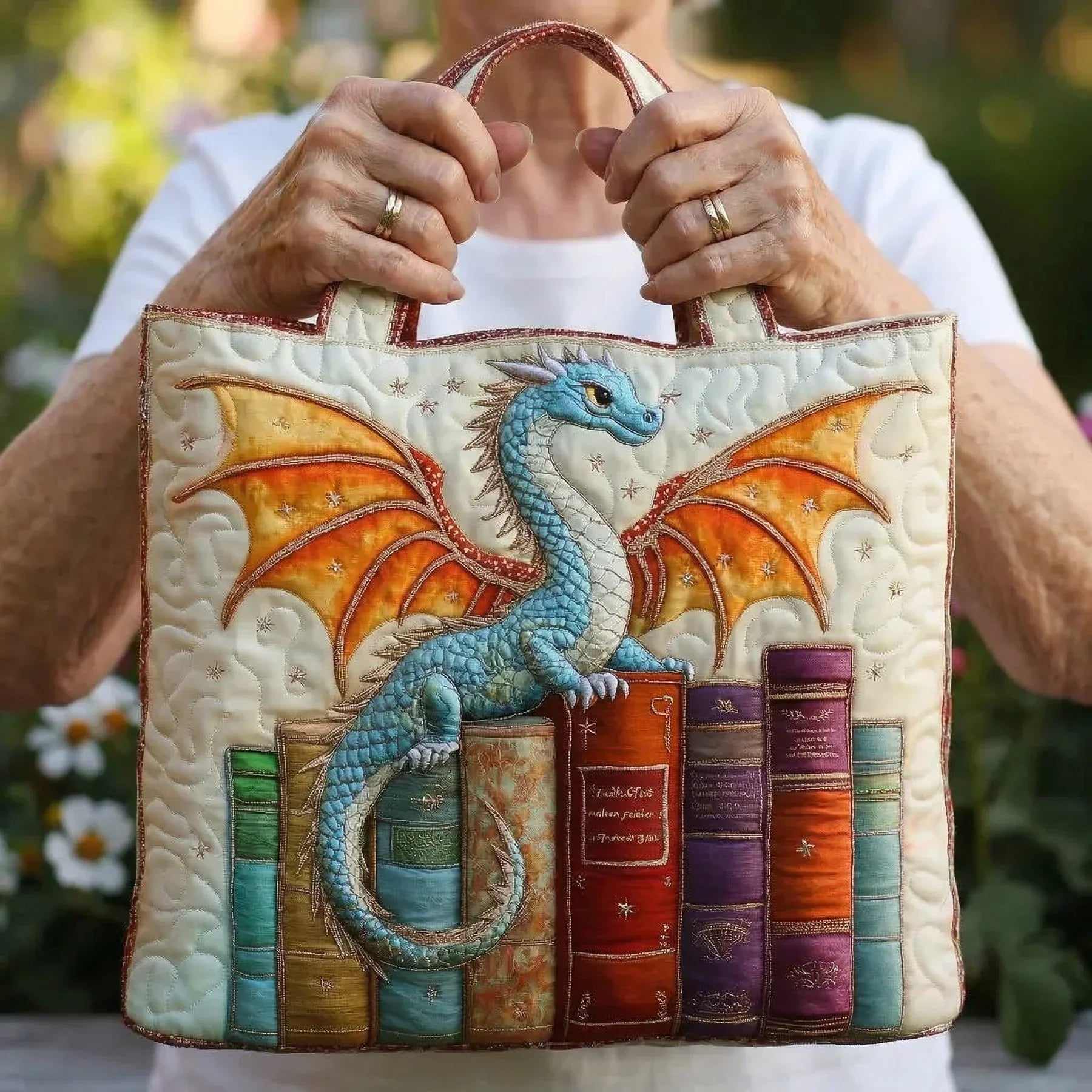Borsa artigianale trapuntata con drago custode dei libri A minha loja